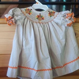 Adorable Smocked Dress with Floral Embroidery